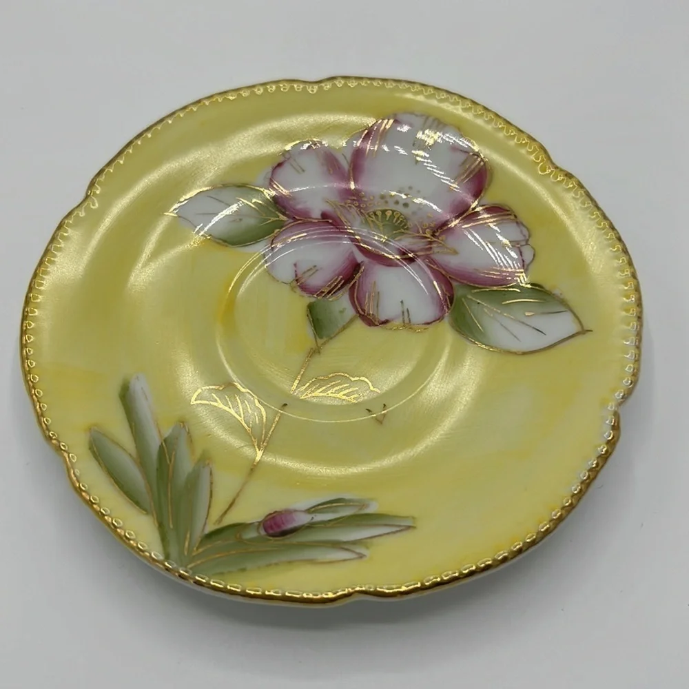 VINTAGE DAINTY LITTLE YELLOW AND PINK FLORAL TEACUP AND SAUCER